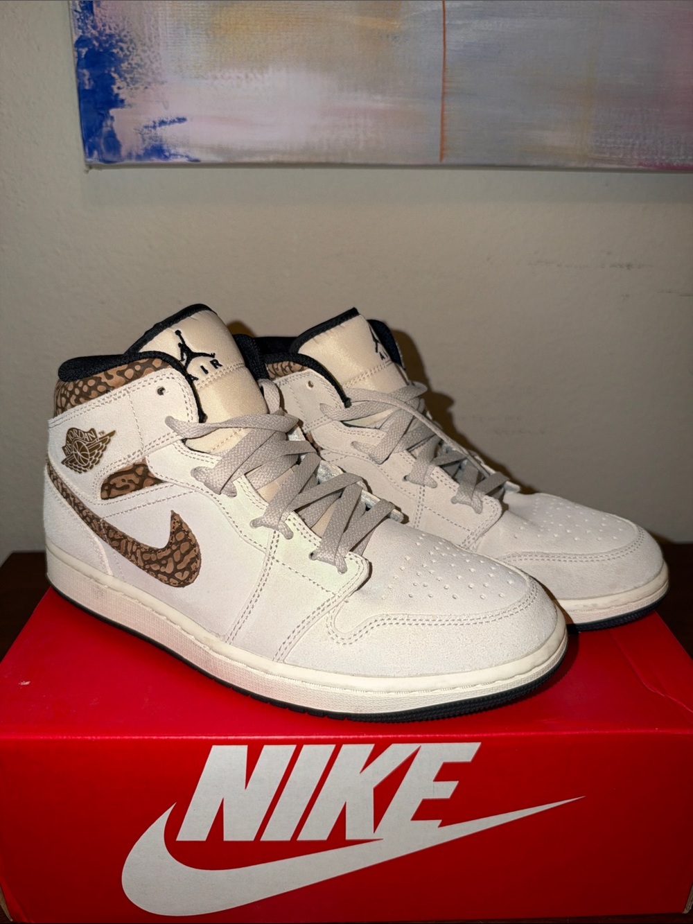 Nike Jordan Cream Mid-Top Sneakers with Brown Patterned Swoosh